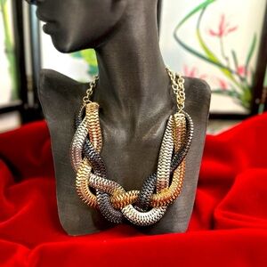 SOLD.  Braided metal estate sale necklace.  Silver, gold, and black tone.
